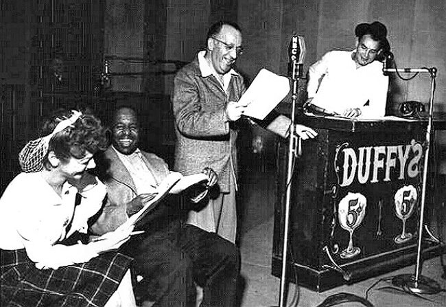 Duffy's Tavern Cast: Cast of radio's "Duffy's Tavern." Pictured from left to right: Sandra Gould ("Miss Duffy"), Eddie Green ("Eddie the Waiter"), Charles Carton ("Finnegan"), Ed Gardener ("Archie").